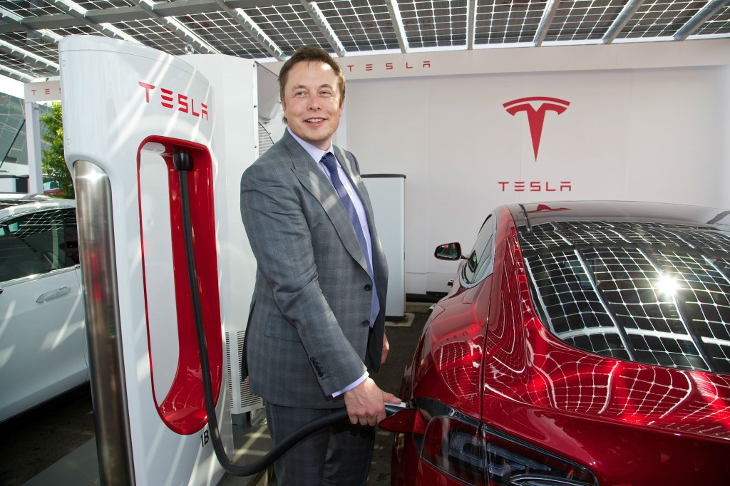Elon Musk with a Tesla Model S