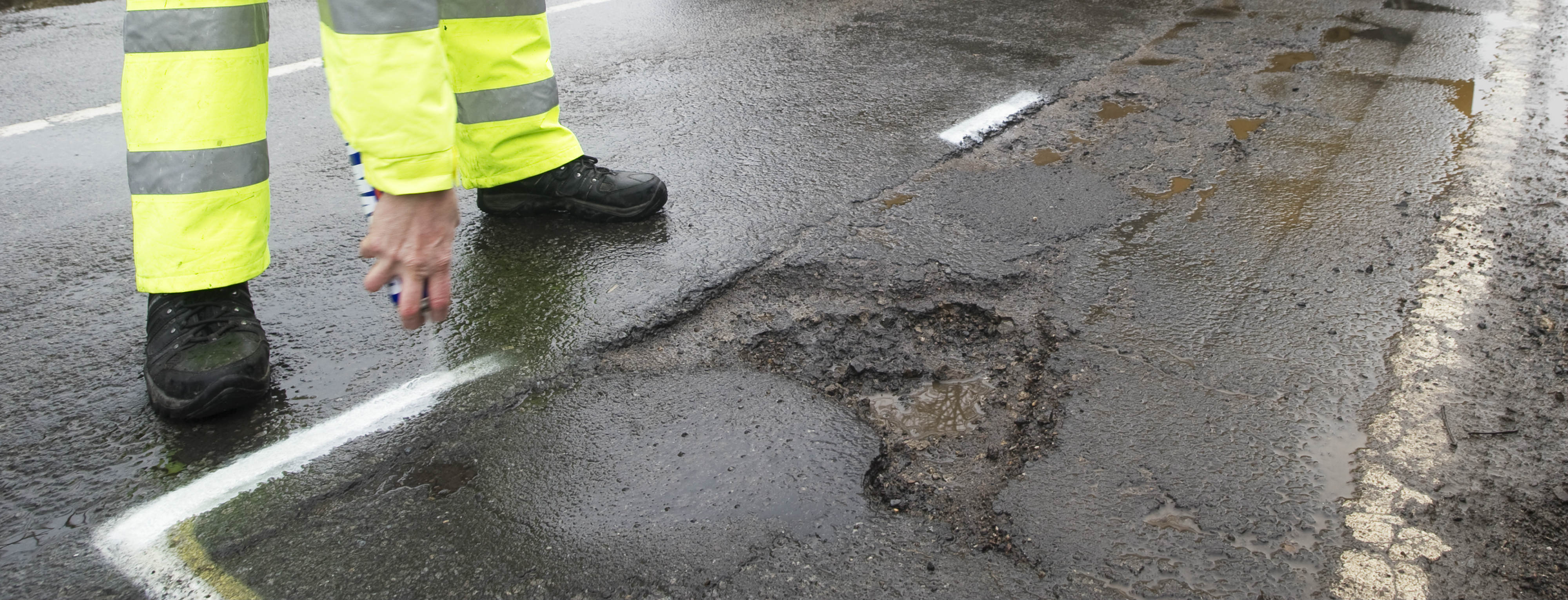 Guide to reporting road faults such as potholes and blocked drains