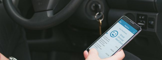 When driving, when should you listen to a voicemail on your phone?