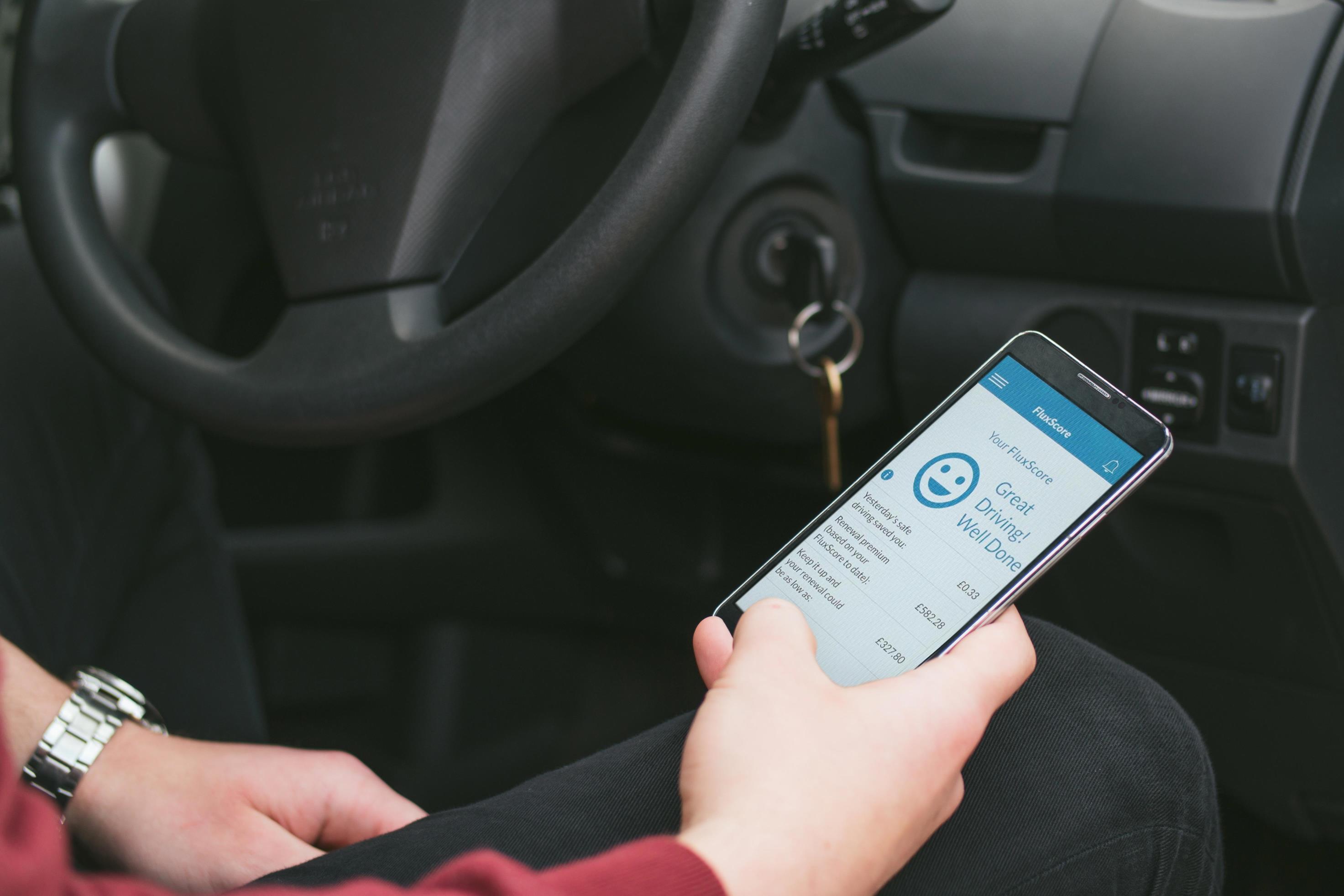When driving, when should you listen to a voicemail on your phone?