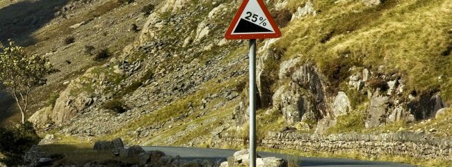 When you see this sign for a steep hill how should you descend?
