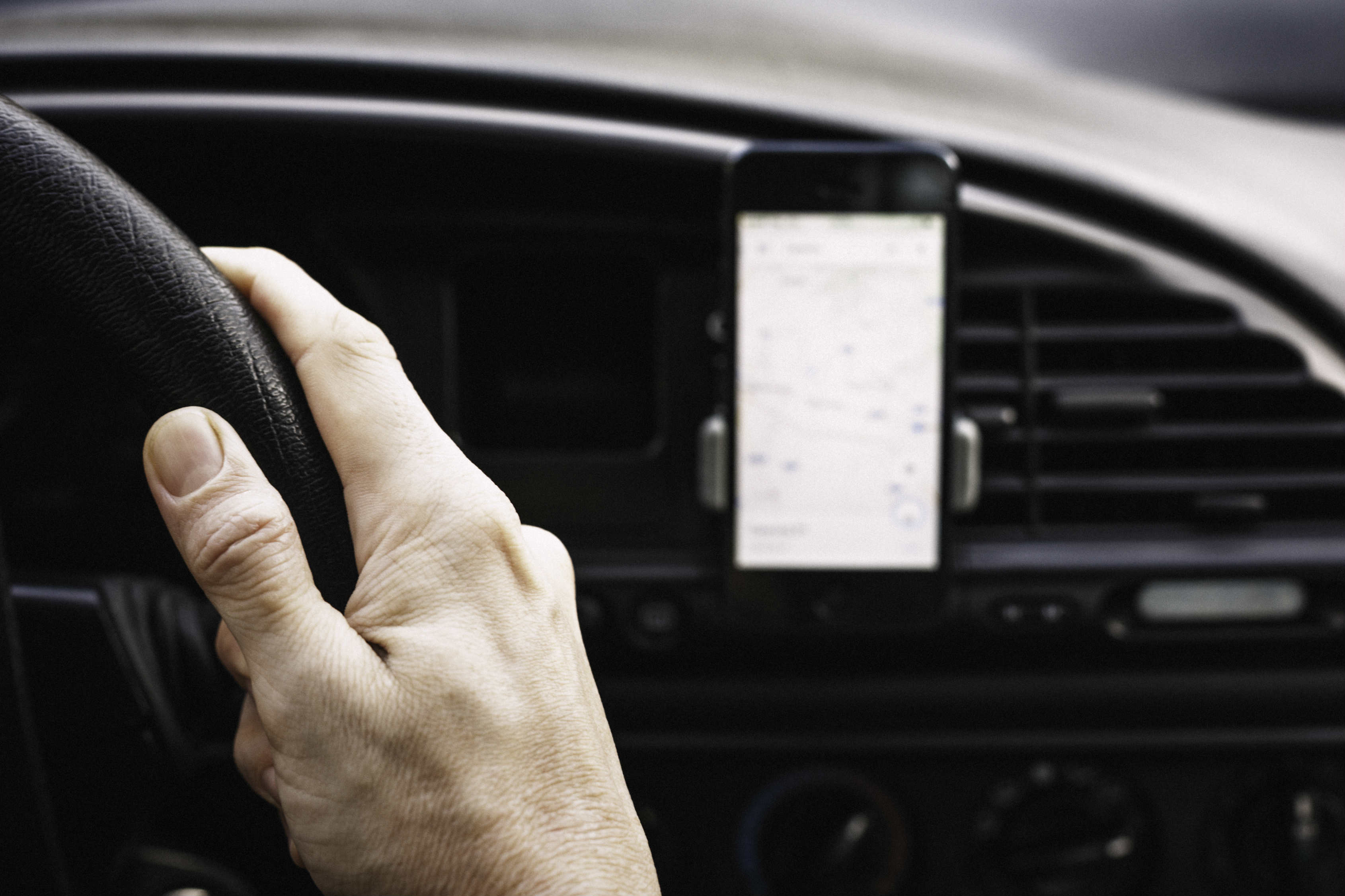 Phone holders how to remain legal in a car when using sat nav or making calls