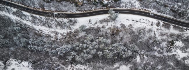 On a cold day, should you warm up a car's engine before driving?