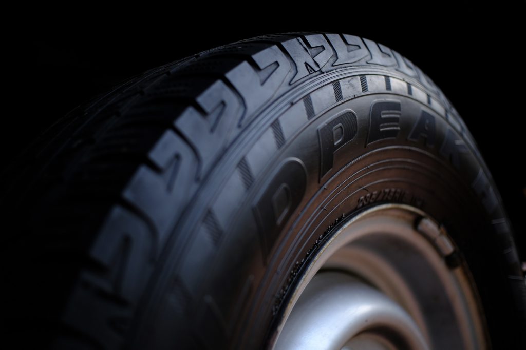 close up edge of a tyre with dark background