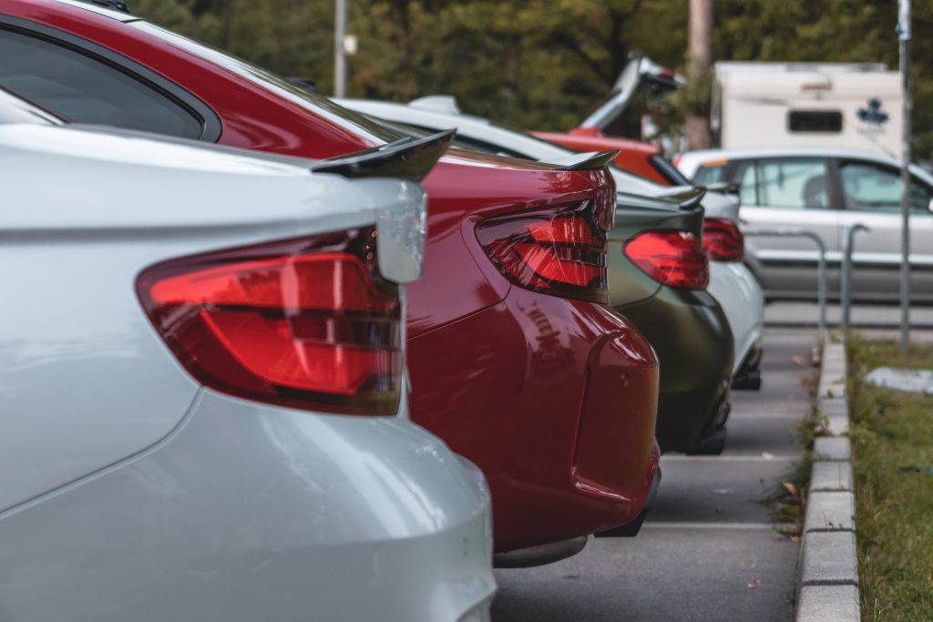 picture showing the back of a line of parked cars