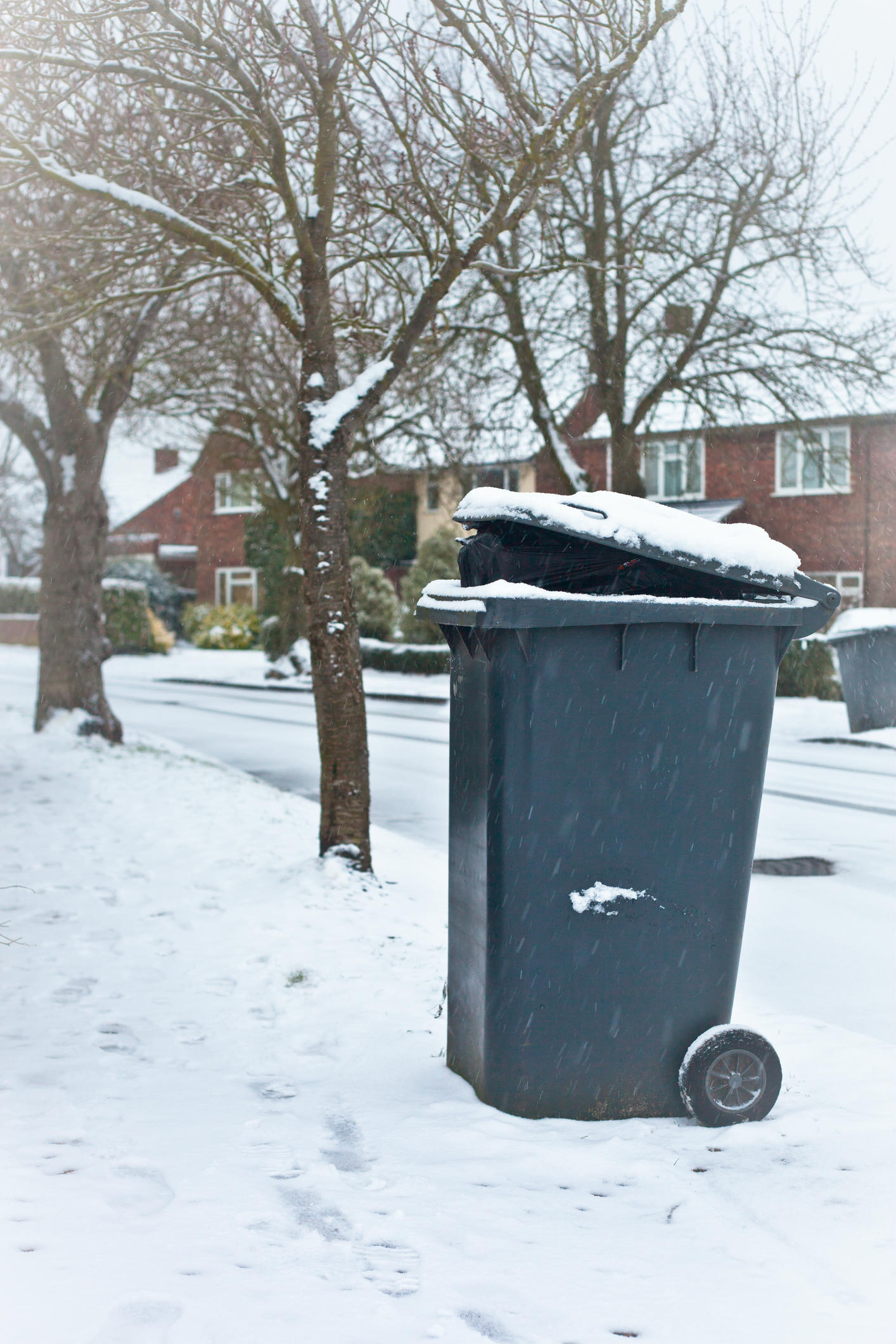 When bins are next to the road what should drivers be wary of