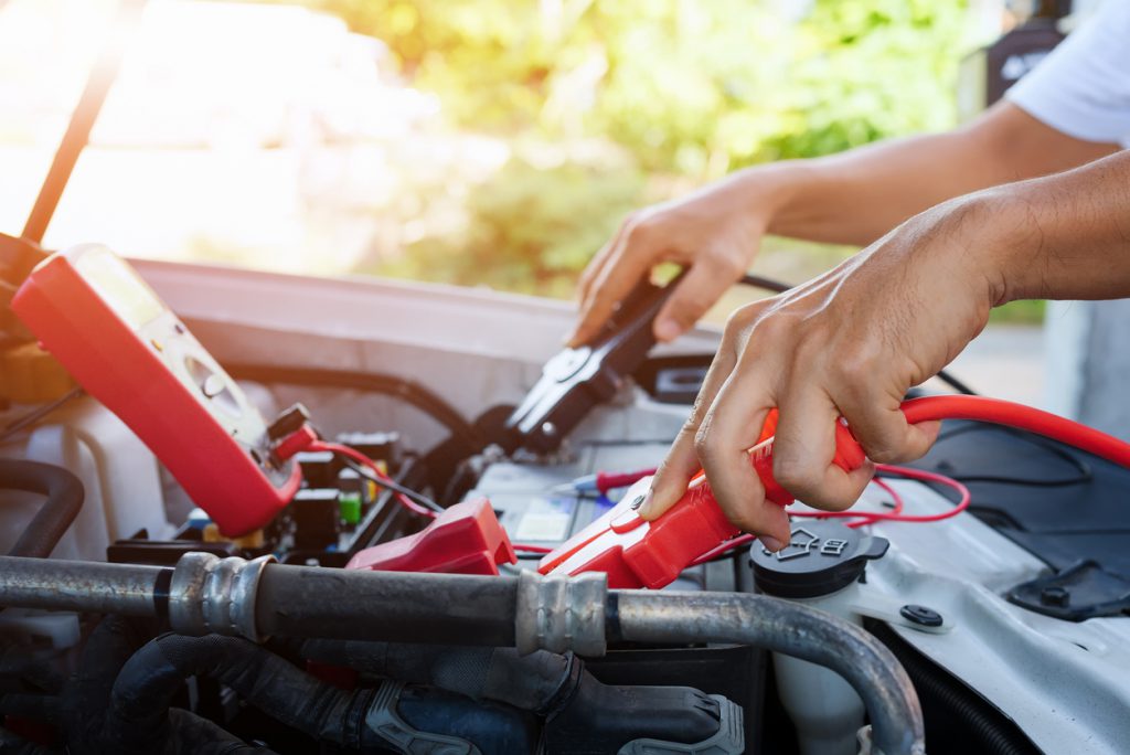 How to charge your car battery with a battery charger - Green Flag