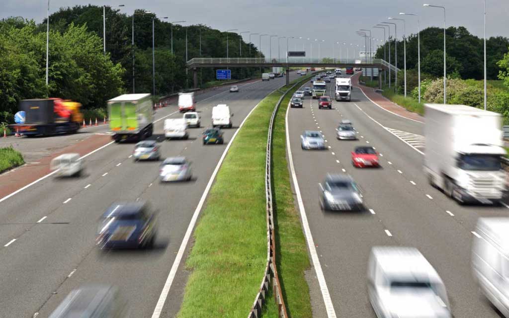 Image of cars on motorway to illustrate what kind of breakdown cover is best for commuting